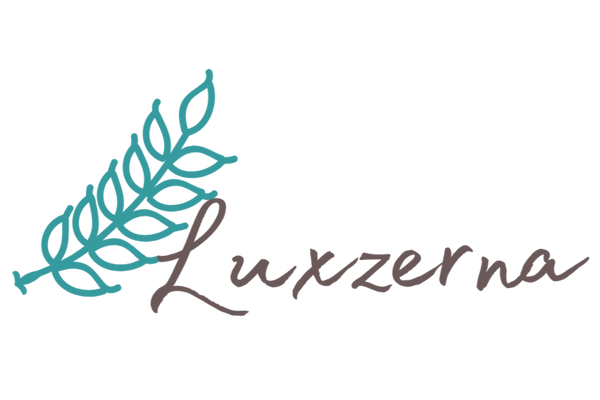 Logo of Luxzerna with a stylized leaf on a white background