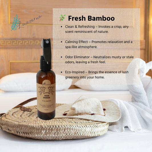 Bamboo-scented spray bottle on a woven tray with a wooden background. Luxzerna Room and Linen