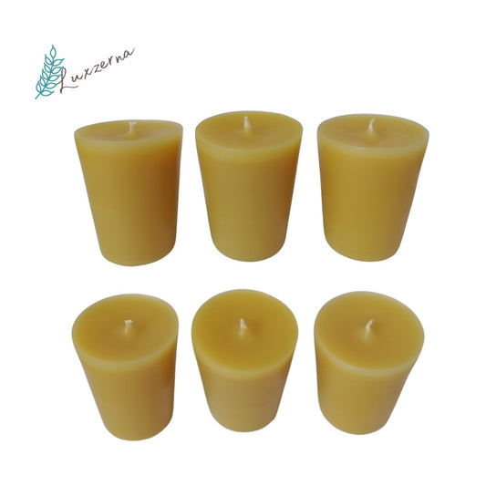 Six yellow beeswax candles on a white background with a brand logo in the corner.